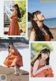 A woman in an orange dress posing on the beach.